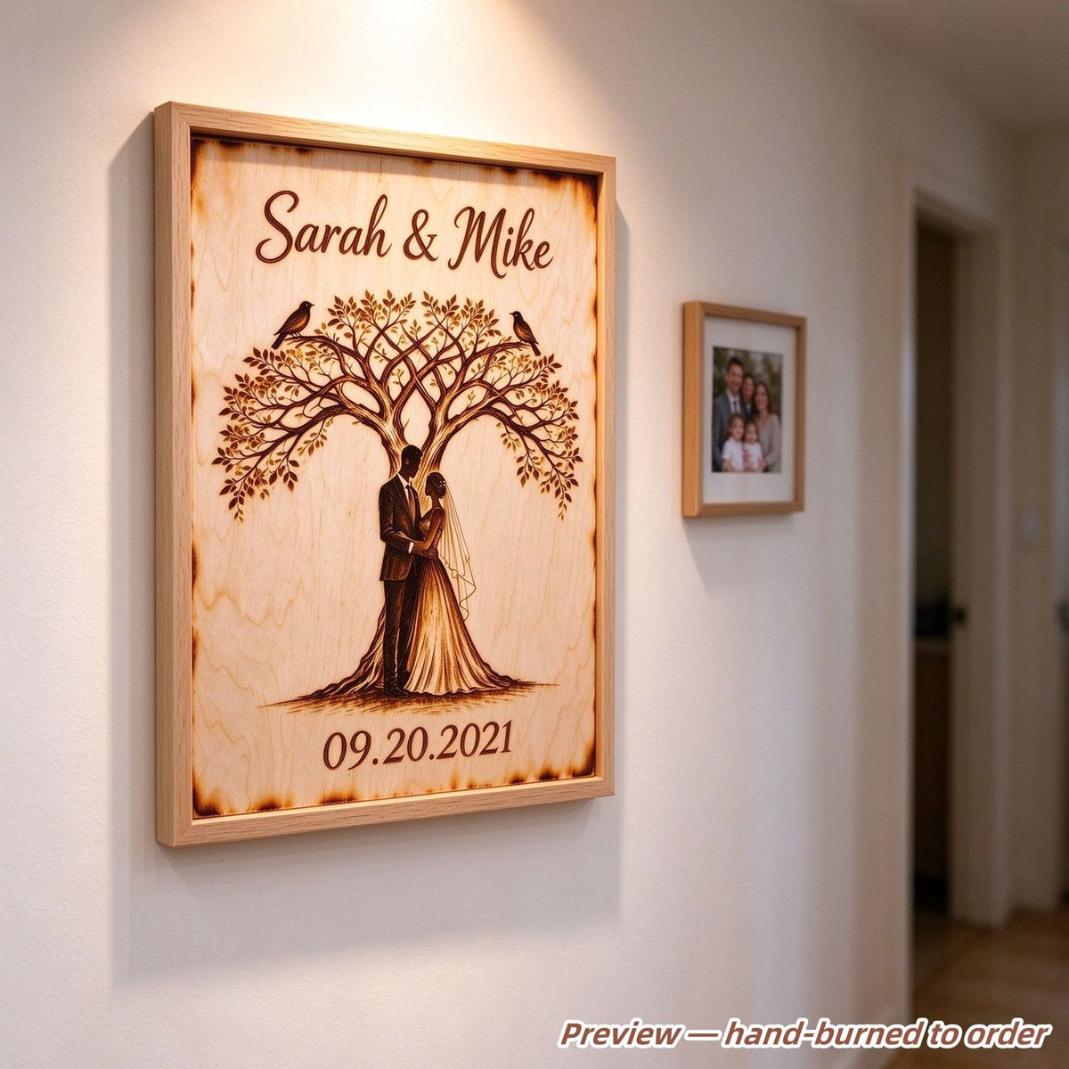 Framed hand-burned wood art hanging on a home wall, personalized wedding gift display
